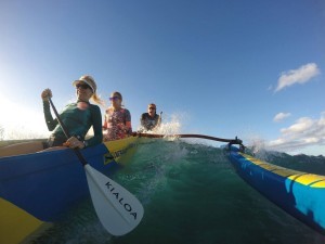 Guests Surf A Wave In A Canoe